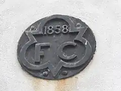 Hydrant sign in Cork, Ireland, dated 1858. The letters "FC" indicate the old name for a hydrant: firecock.