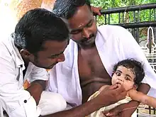 Image 12Annaprashanam is the rite of passage where the baby is fed solid food for the first time. The ritual has regional names, such as Choroonu in Kerala. (from Samskara (rite of passage))