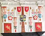 Fireplace in the hall, showing the quartered arms of the Wynn family, surrounded by badges and caryatids