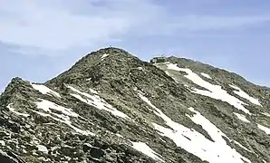 The Pico del Cervunal (foreground) and the Pico del Lobo (background) in El Cardoso de la Sierra. The Pico del Lobo stands as the tallest summit in the region at 2,273 metres above mean sea level.