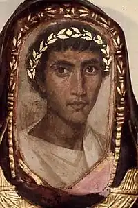 Room 62 – Detail from the mummy case of Artemidorus the Younger, a Greek who had settled in Thebes, Egypt, during Roman times, 100–200 AD