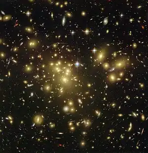 Abell 1689 - actual gravitational lensing effects (Hubble Space Telescope).