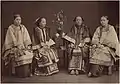 Qing dynasty Han Chinese women wearing Manchu-influenced aoqun and qungua.