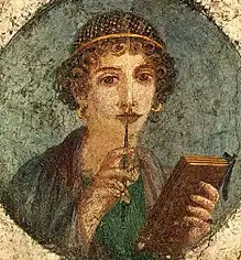 Image 52Woman holding wax tablets in the form of the codex. Wall painting from Pompeii, before 79 CE. (from History of books)