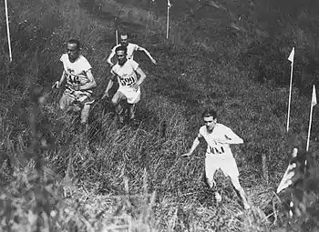 Image 29Edvin Wide, Ville Ritola, and Paavo Nurmi (on left) competing in the individual cross country race at the 1924 Summer Olympics in Paris; due to the hot weather, which exceeded 40 °C (104 °F), only 15 out of 38 competitors finished the race. (from Cross country running)