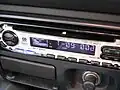 A car stereo head unit in a dashboard