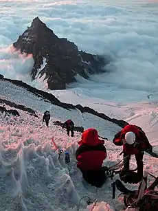 Image 5Mountain climbers ascending Mount Rainier looking at Little Tahoma Peak (from Mountaineering)