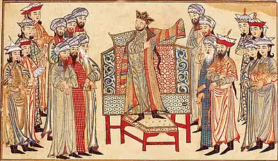 Sultan Mahmud of Ghazni receiving a richly decorated robe of honor from the caliph al-Qadir in 1000. Miniature from the Rashid al-Din's Jami' al-tawarikh