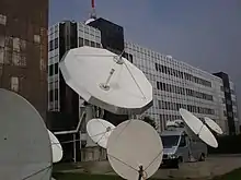 Light-colored satellite dishes on the HRT building in Zagreb