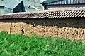 An old mud wall at Rearsby that is a habitat for solitary bees.