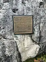 Plaque at the base of the lower range light for The Ridges Sanctuary.