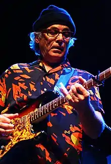 Ry Cooder playing slide guitar