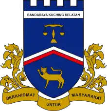 An example of canting arms outside Europe: the Malaysian city of Kuching features a cat on its municipal coat of arms, kuc(h)ing being the Malay word for cat