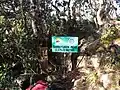 The mountain peak signboard.