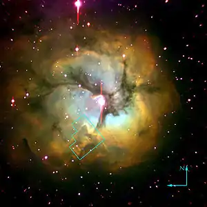 The Trifid Nebula. The outlined area is enlarged right.